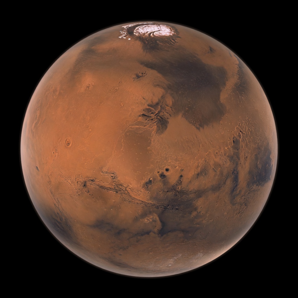 Mars from nearby space, in the foreground.